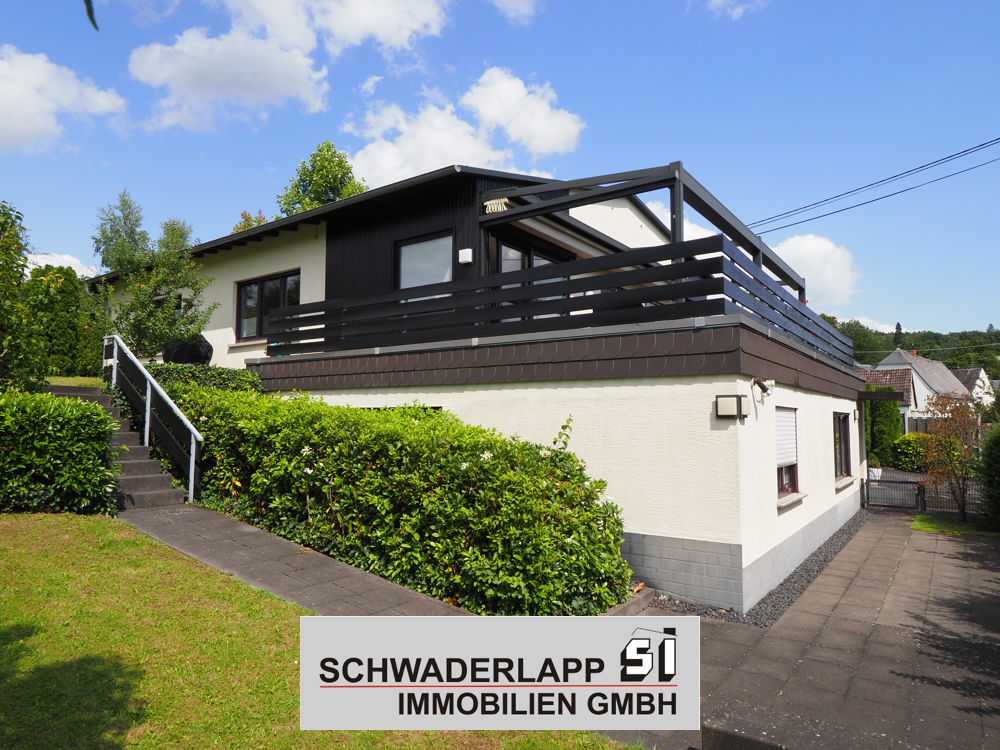 10895 - Hochwertiges Einfamilienhaus mit ELW in ansprechender Ortsrandlage von Hilgert